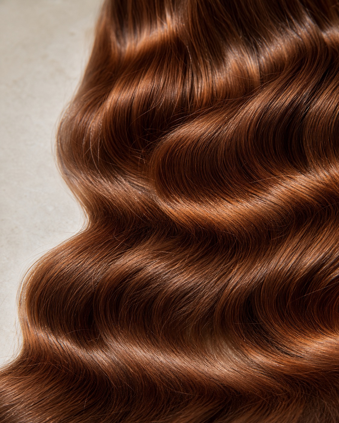 Illustrative custom auburn human hair color and texture